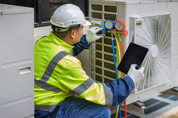Professional Heat Pump Repair technician working in Woodstock Valley, CT